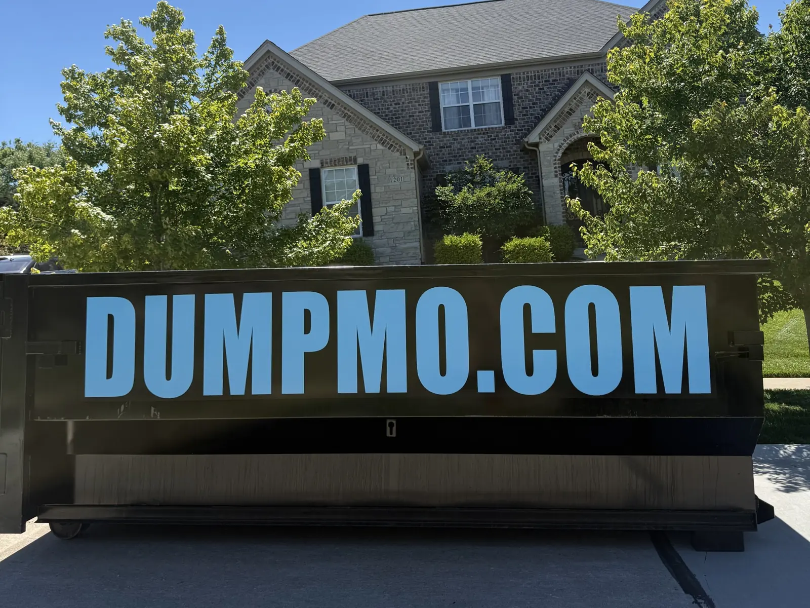 Dump Mo branded roll-off dumpster